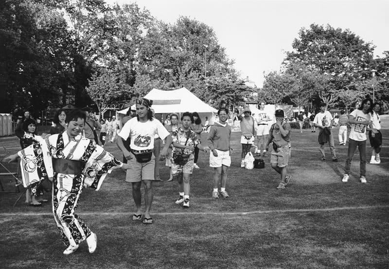 Photo of people doing the tanko bushi, by Tamio Wakayam